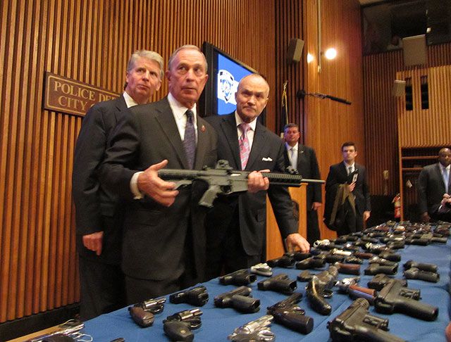 Mayor Bloomberg, with Manhattan DA Cy Vance and Commissioner Ray Kelly, seemed reluctant to pick up the assault rifle
